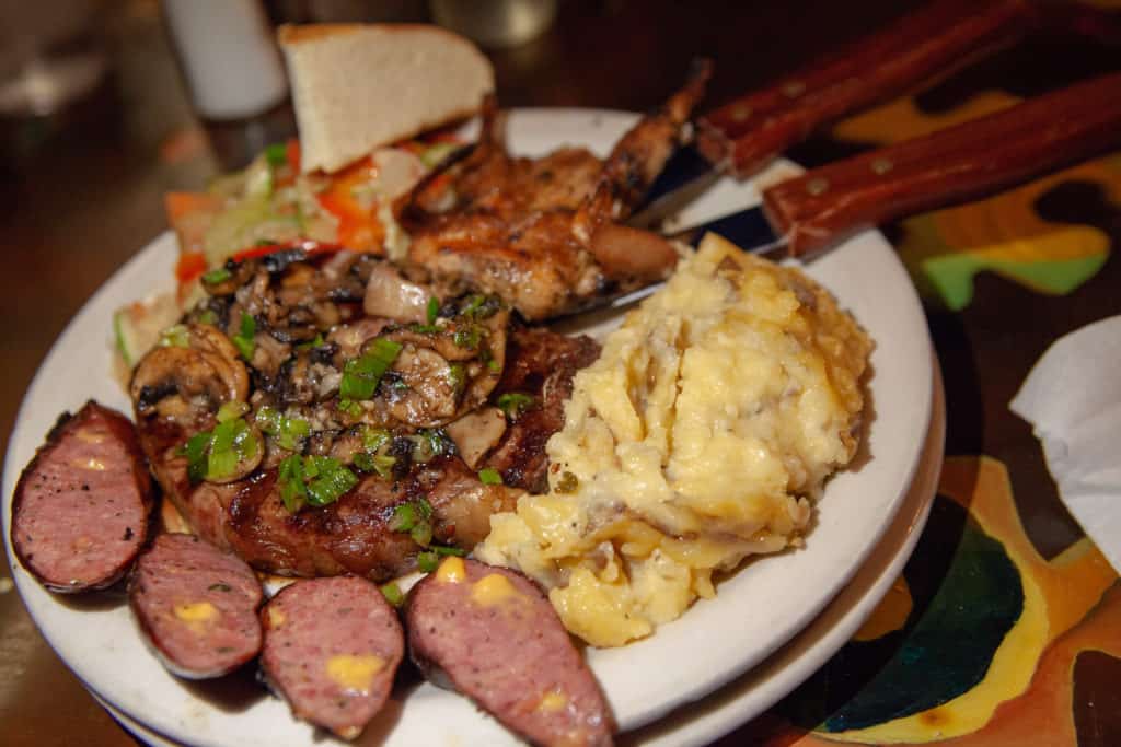 a plate of food with knife and fork