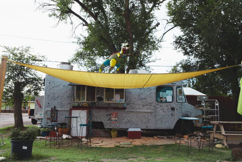 a yellow tarp over a foodtruck