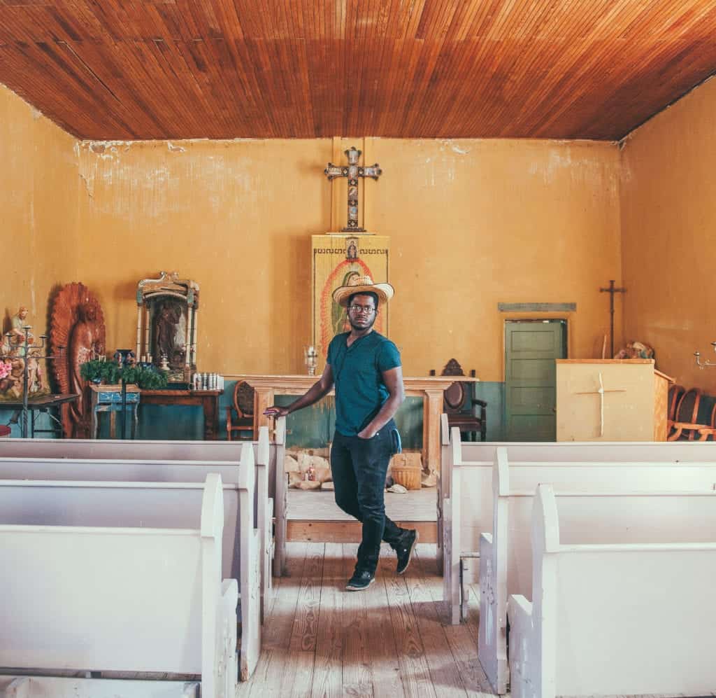 a person standing in a church