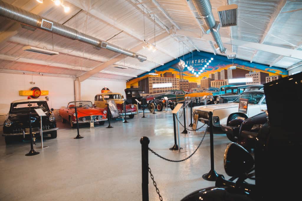 Exhibit of vintage cars in a museum 