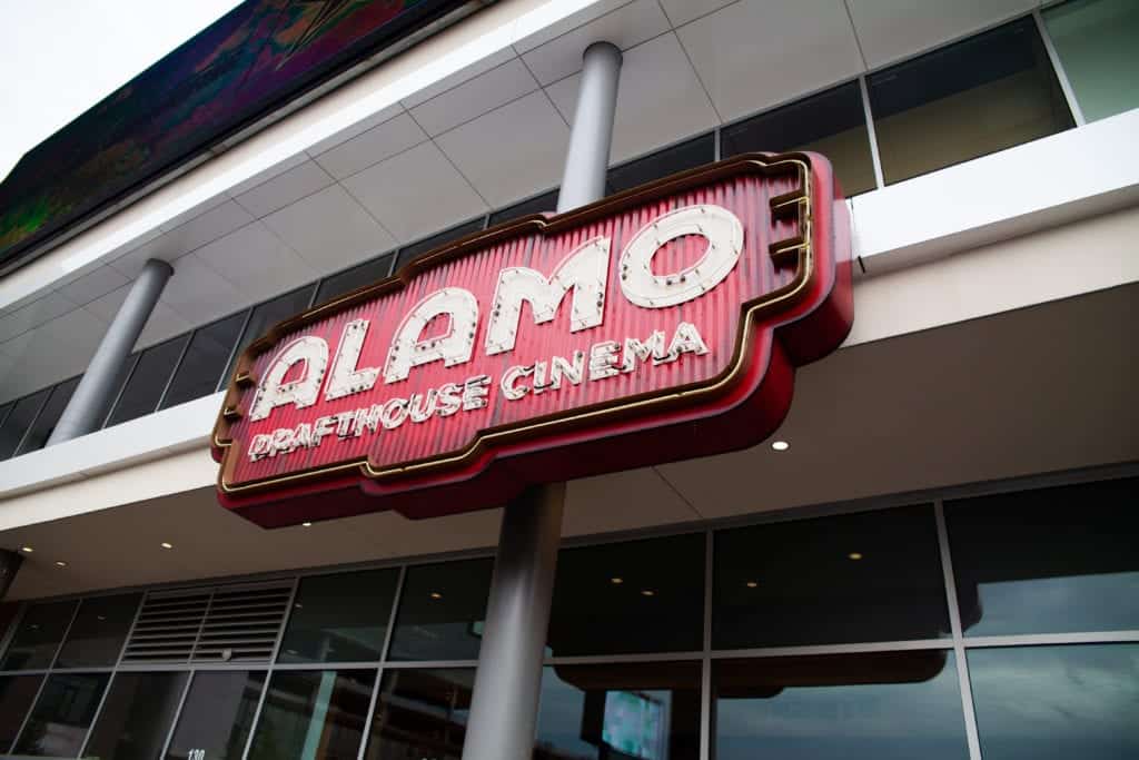 A neon sign of a cinema.