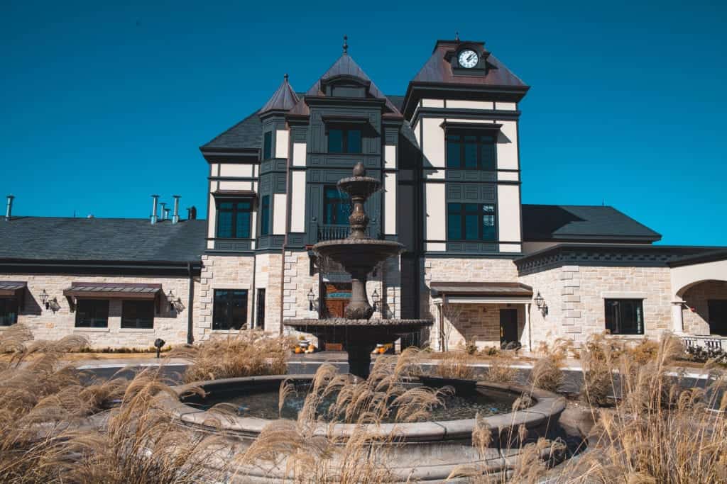 a building with a fountain in front of it