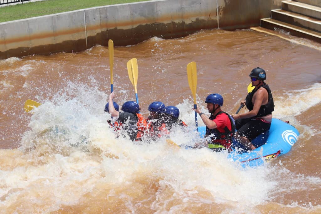 a group of people rafting