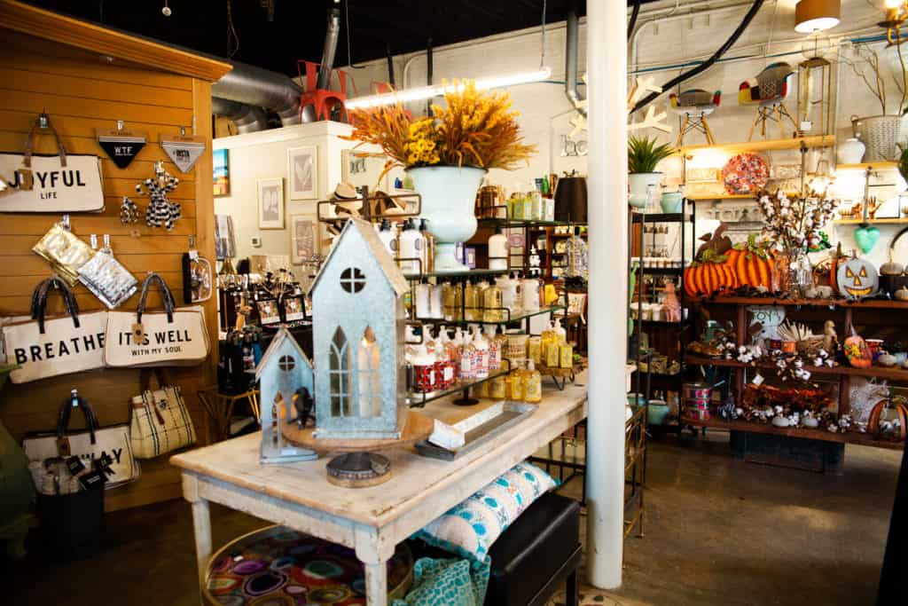 a store with a table with objects on it