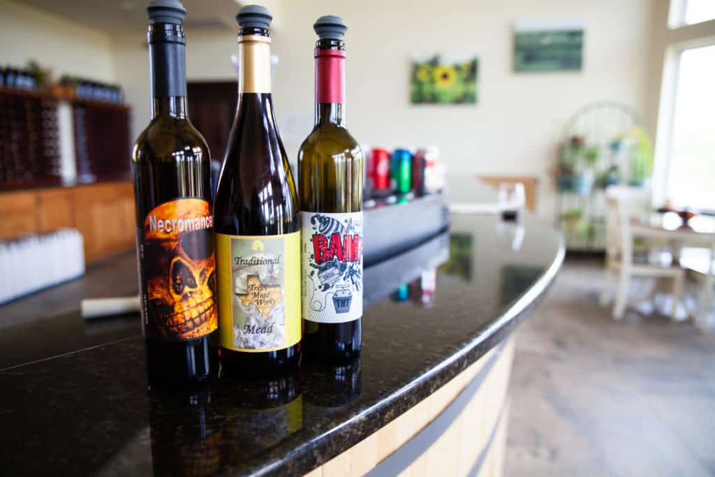 a group of bottles on a counter