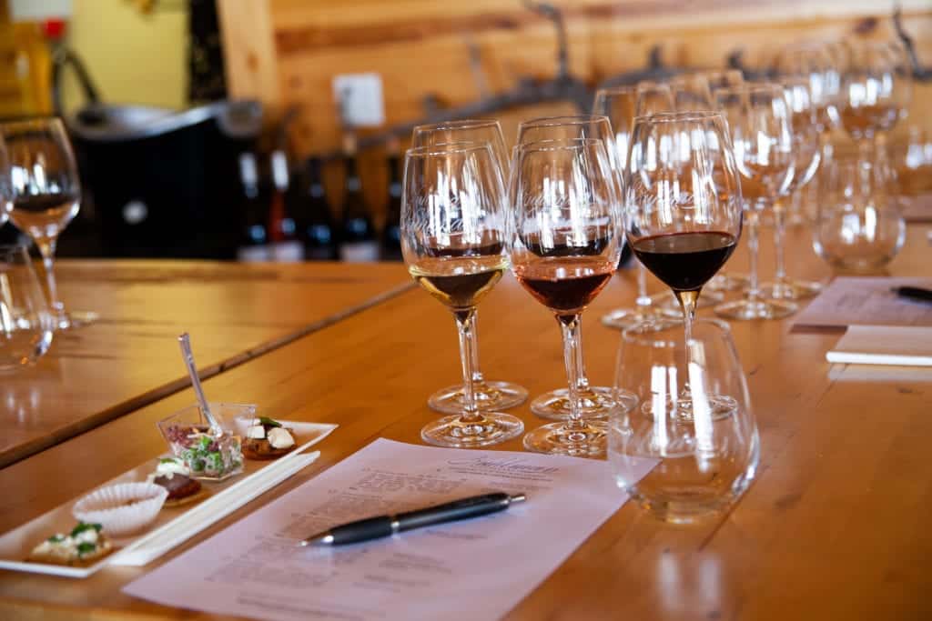 a group of wine glasses on a table