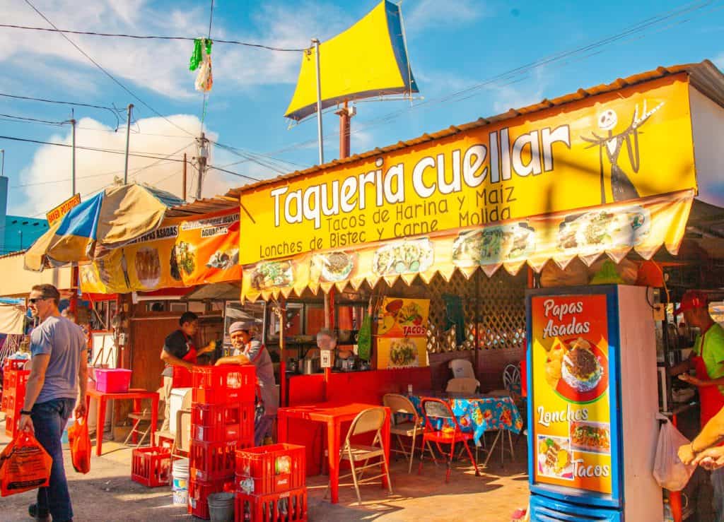 a food stand with tables and chairs