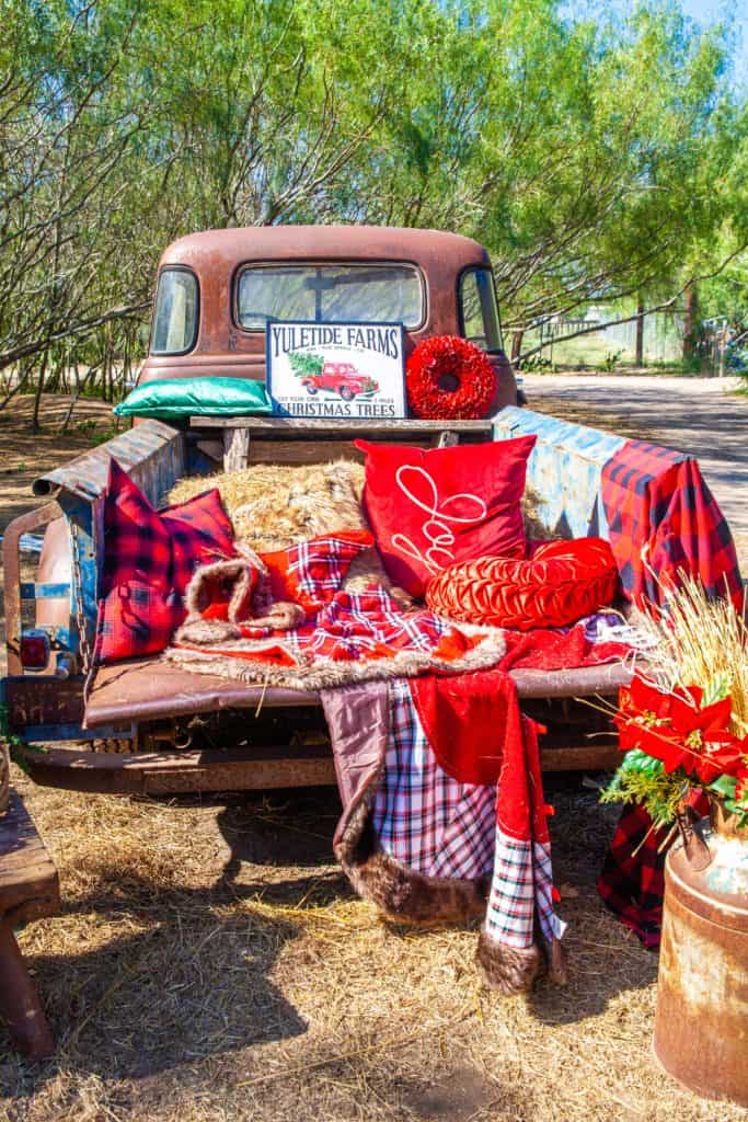 a truck with blankets and pillows