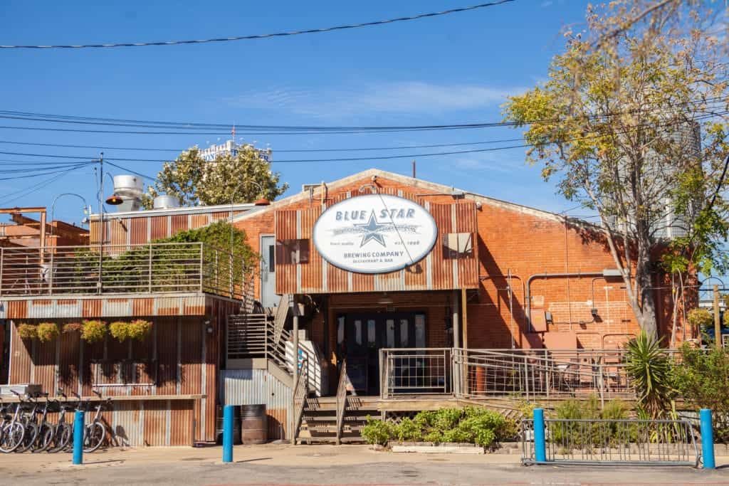 a building with stairs and a sign