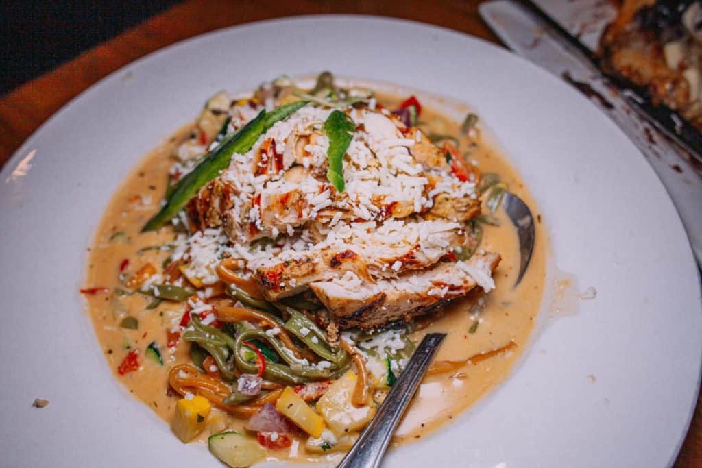 a plate of food with a spoon