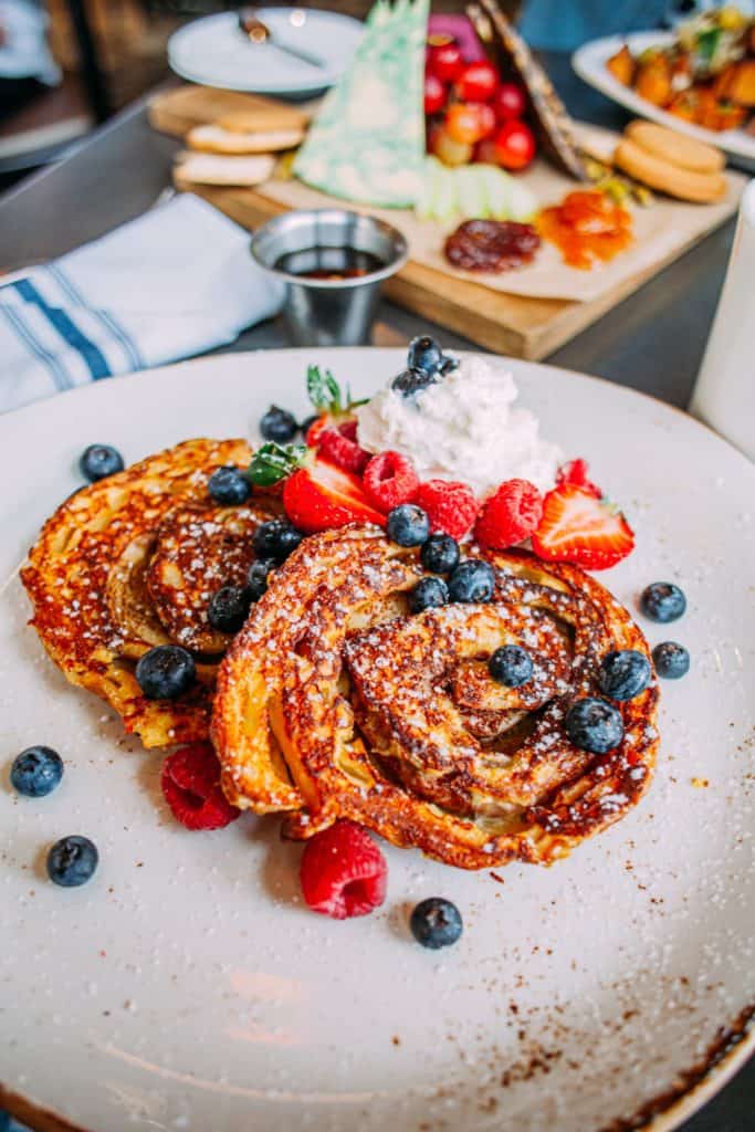 a plate of food with fruit on it