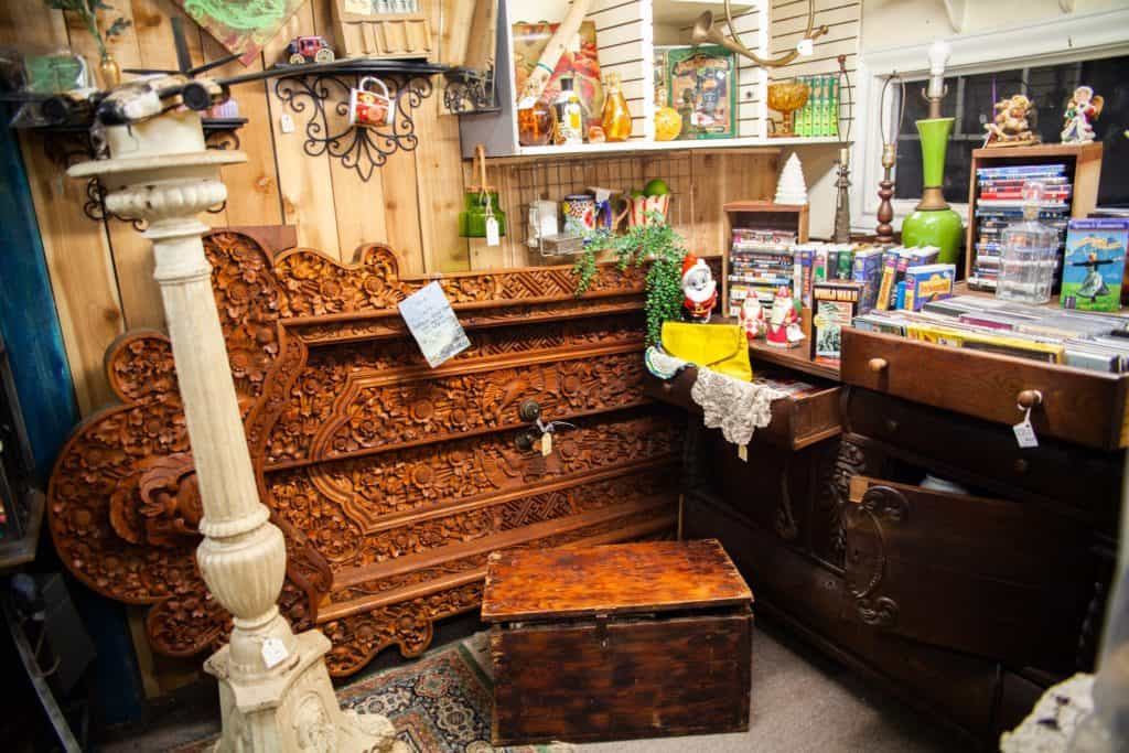 a room with a dresser and a box