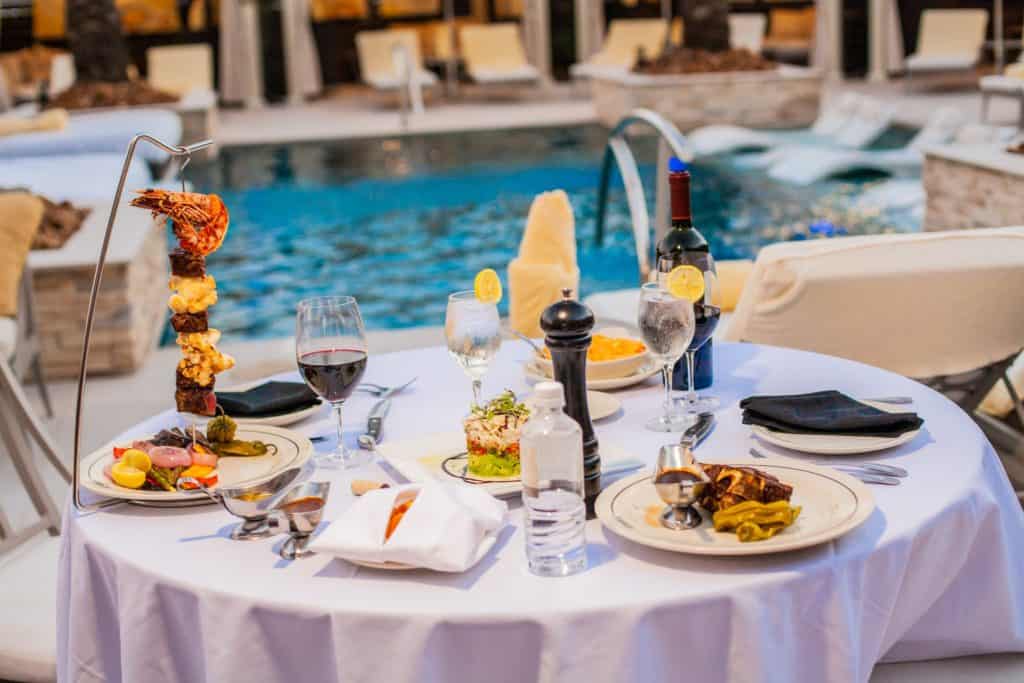 Elegant poolside dining setup