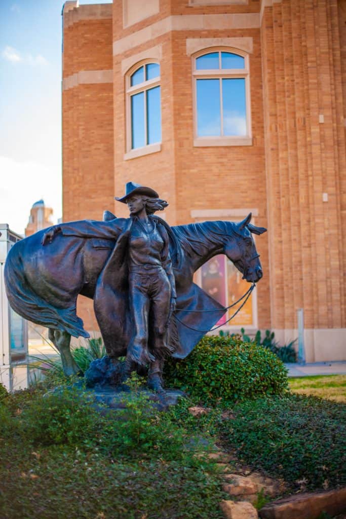 a statue of a person and a horse