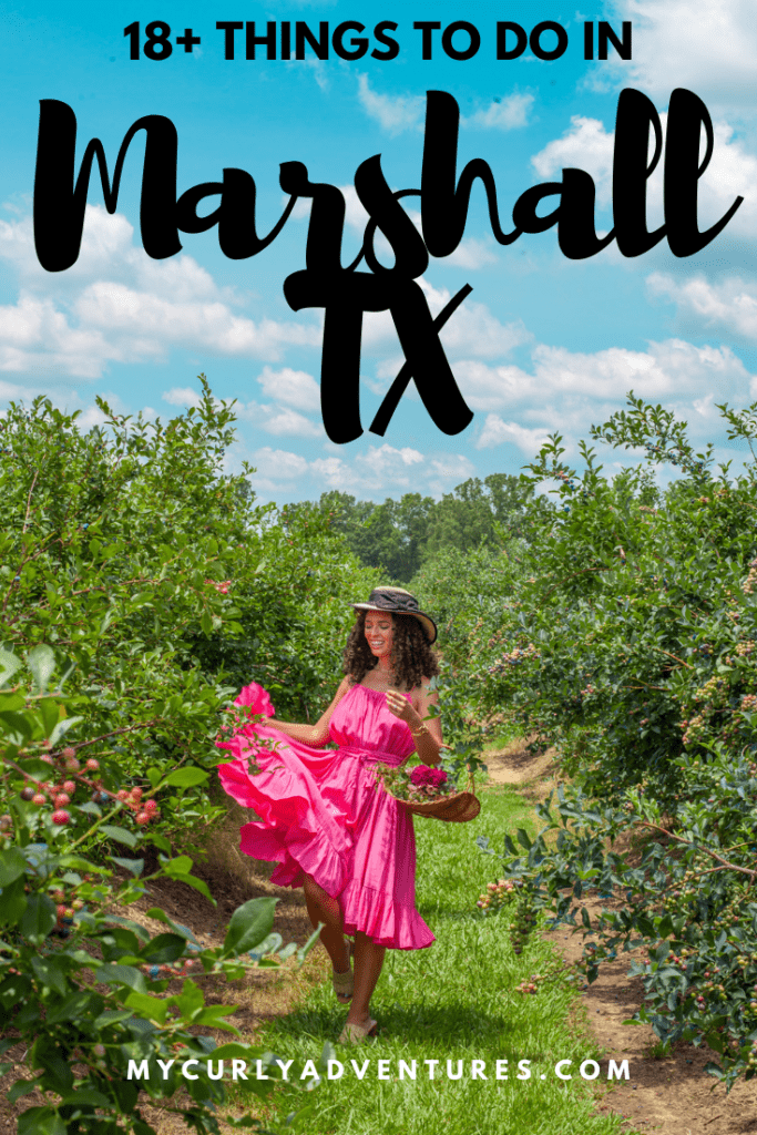 a person in a pink dress in a garden