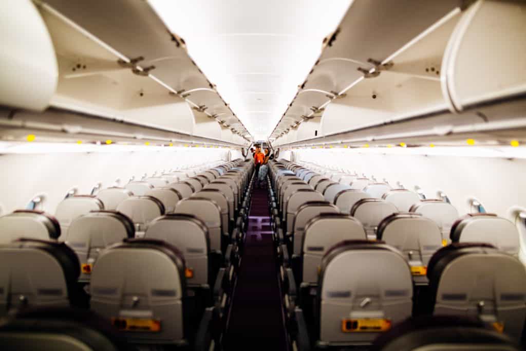 How to Survive a Long Haul Flight in Economy