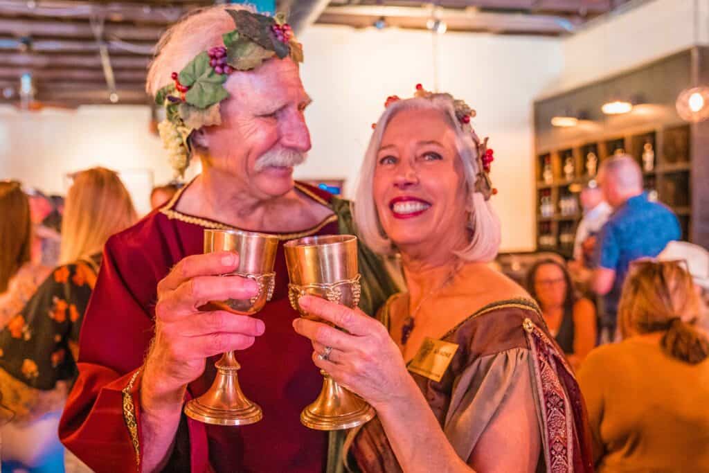 Couple in costume at Grapevine Urban Wine Trail