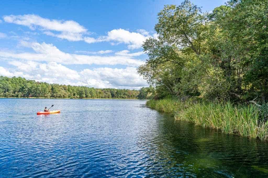 Someone riding in a kayak on Lake Tyler TX Lake Getaway