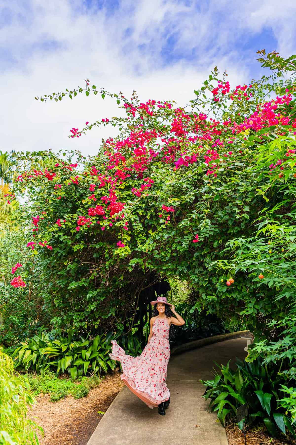 Jessica standing under some flowers in a garden in St. Petersburg Romantic Things to Do Date Ideas Couples