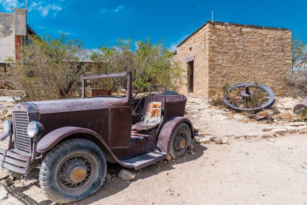 Old car parked outside of building in Terlingua