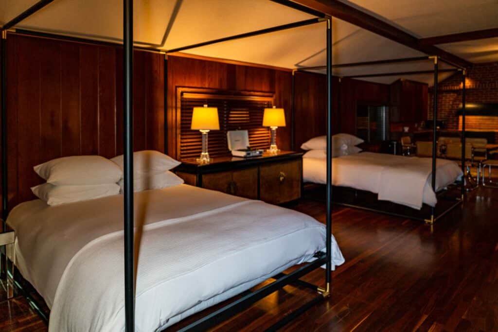 Two queen beds inside the carriage house at hotel RITUAL