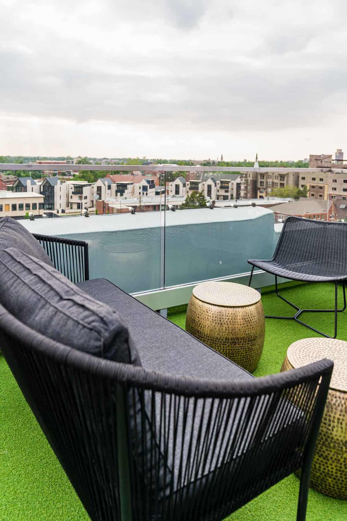 Patio furniture and view of the city at O'Bar in OKC