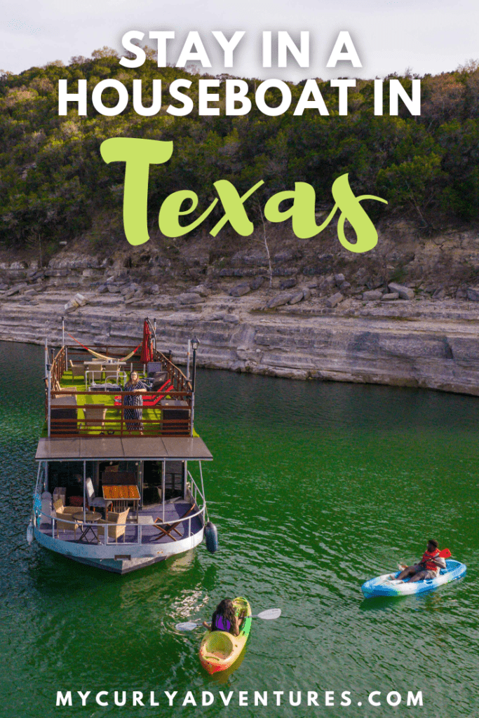 Kayaking on Lake Travis with Houseboat at the background