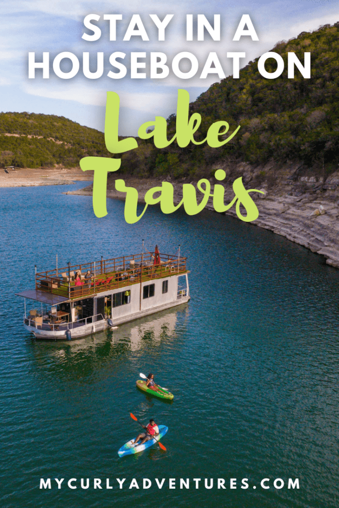 Kayaking on Lake Travis with Houseboat at the background