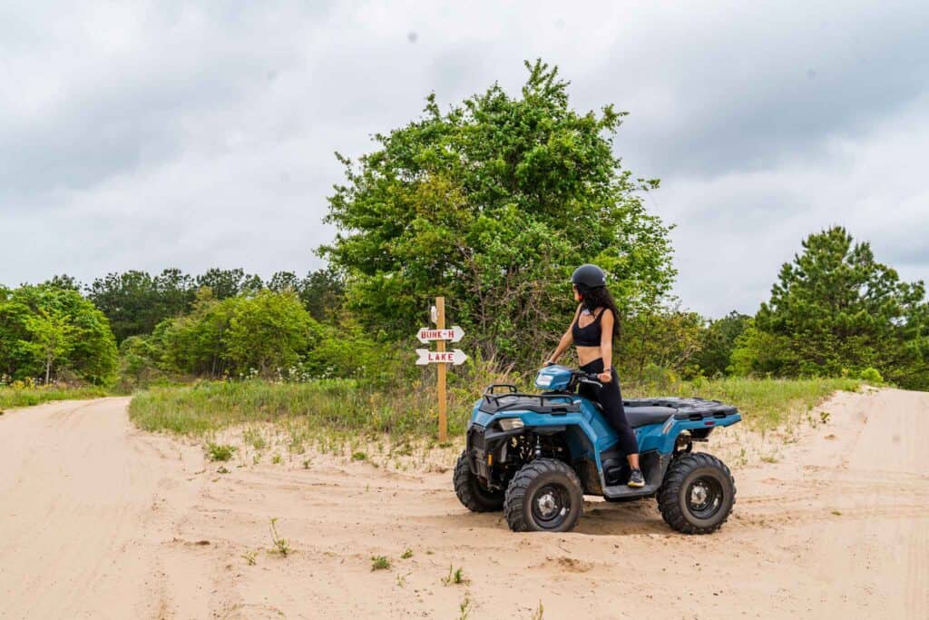 Lady Riding a blue ATV