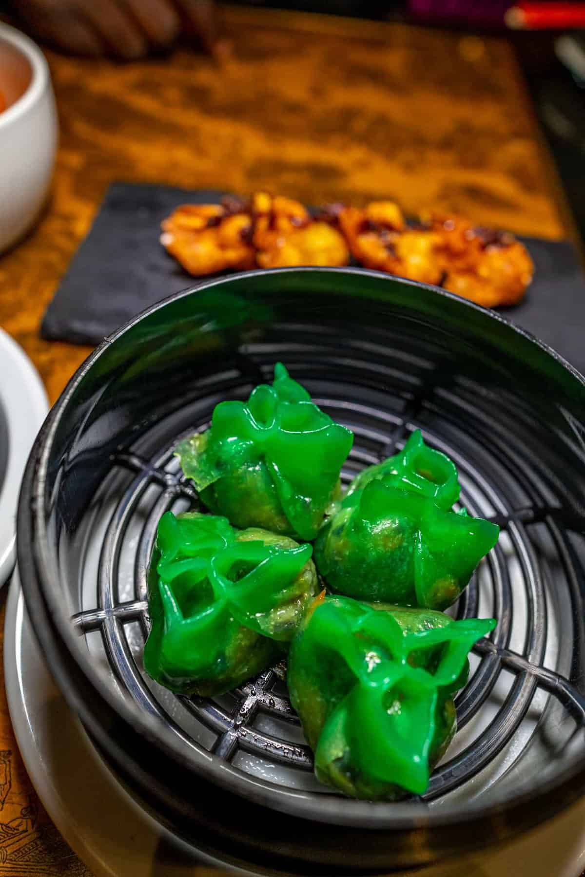 Green dumplings at Neon Kitten speakeasy in DFW