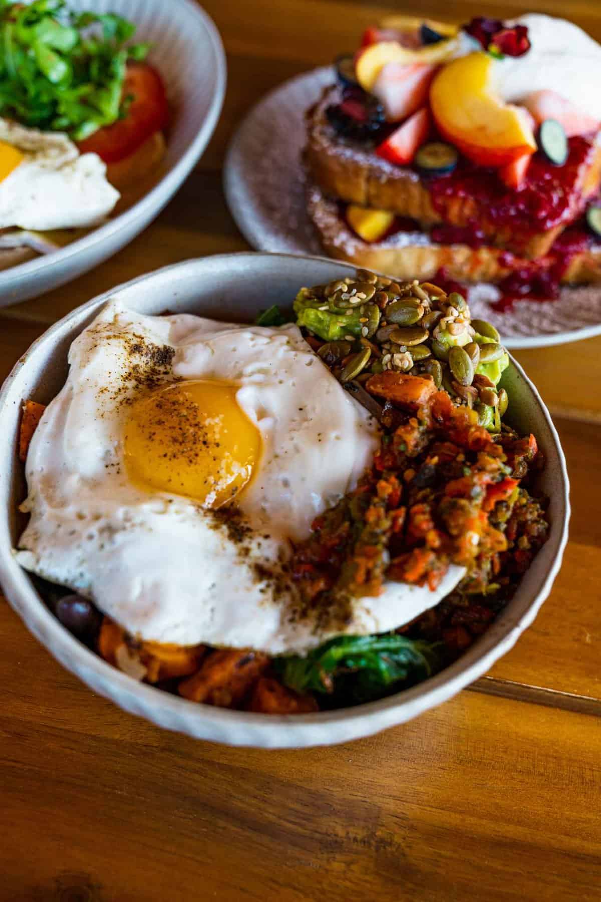 Sweet Potato Bowl topped with a fried egg