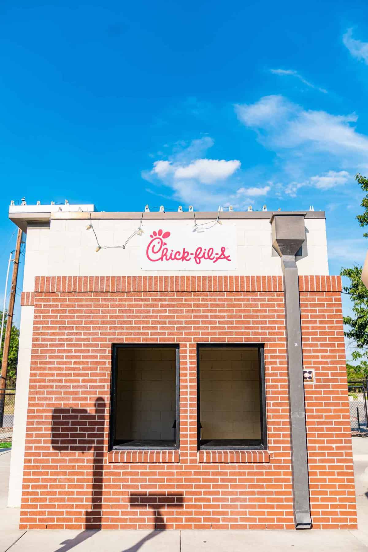 Chic-fil-A brick building with 2 big open windows