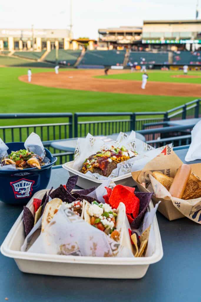 Assorted Foods with a Football Field on the Background