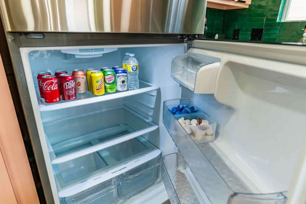 Refrigerator with complimentary drinks