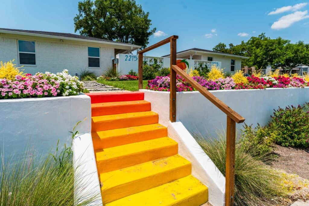 Yellow gradient stairs to the courtyard