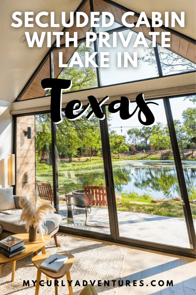  floor-to-ceiling windows in the living room that overlook the lake