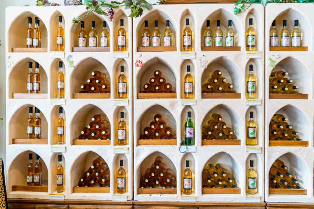 Shelves full of wine bottles