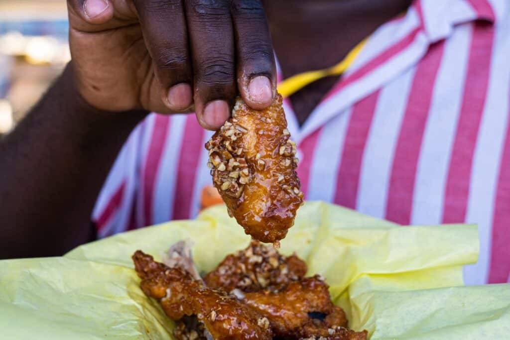 Fried chicken wings with a honey pecan sauce