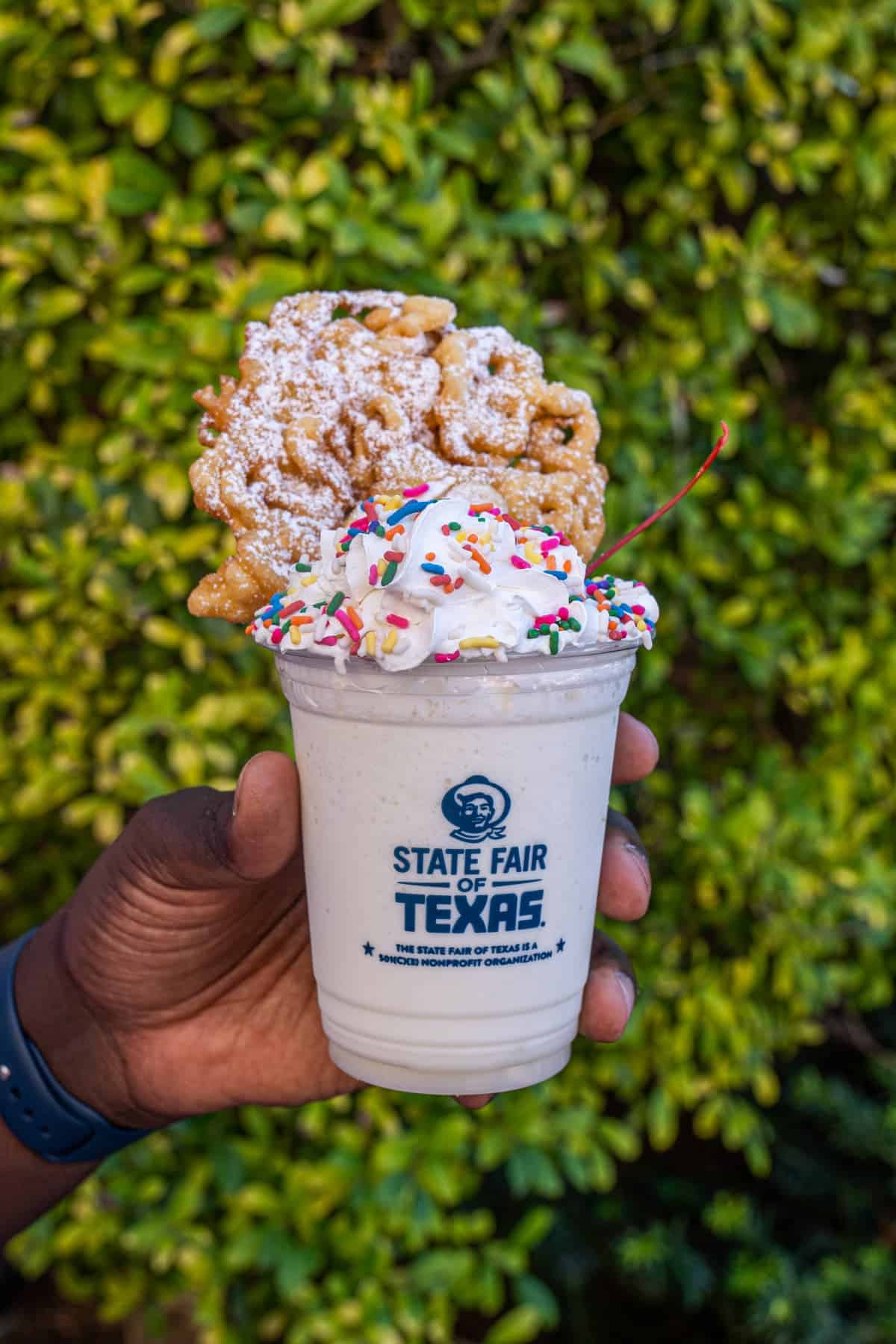 Ice cream shake topped with a funnel cake