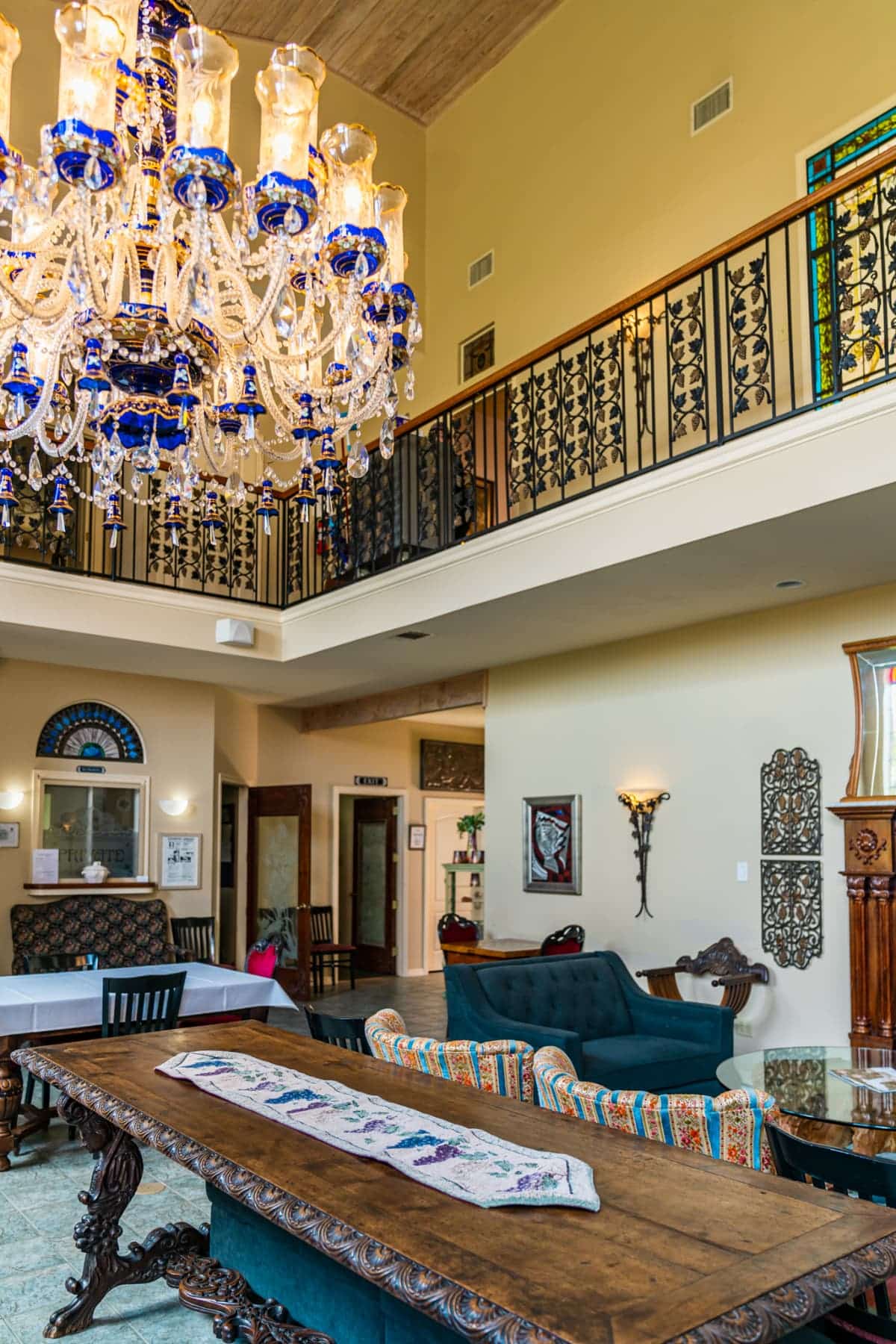 Entryway of the villa with an elaborate chandelier overhead