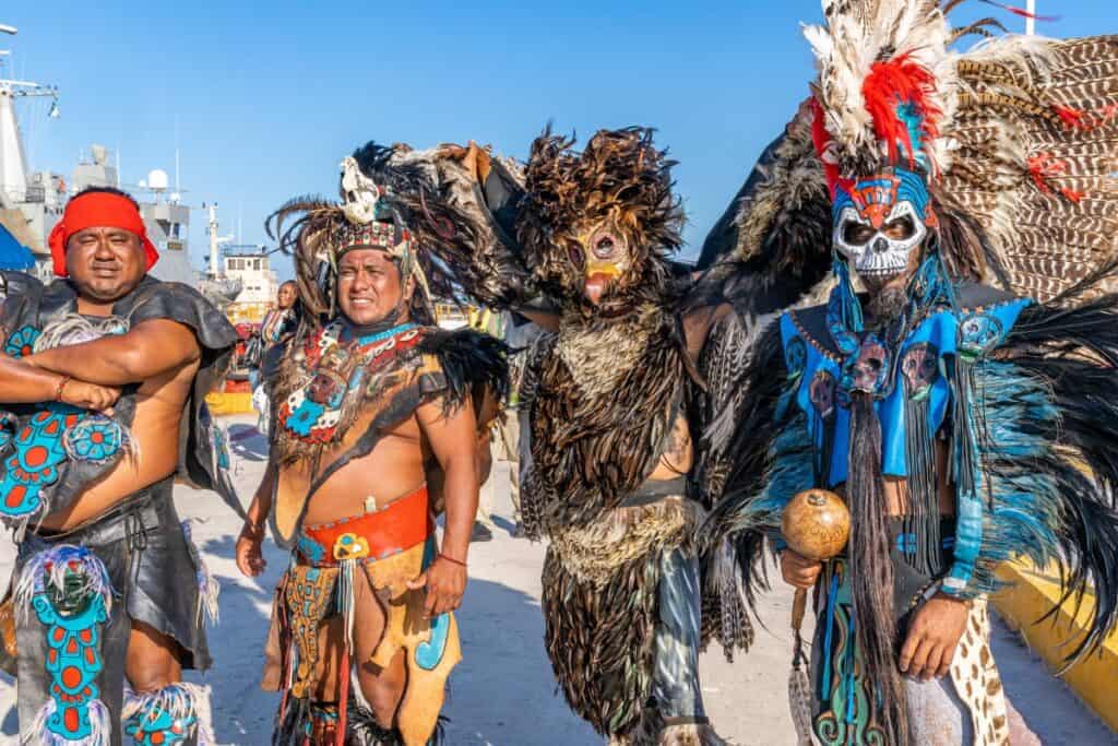 Dance performers in Mexico wearing traditional outfits