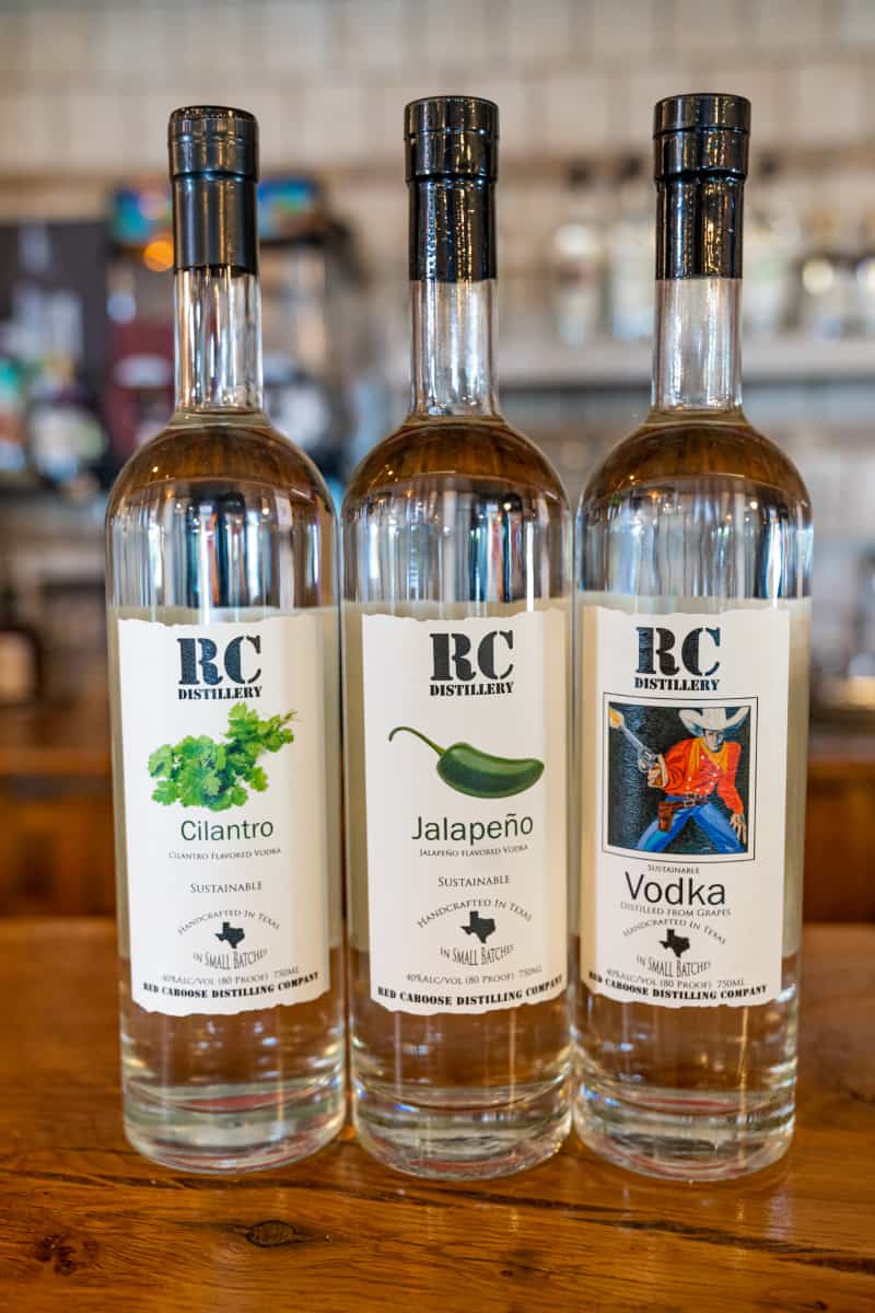 Three bottles of flavored vodka Things to Do in Clifton Tx