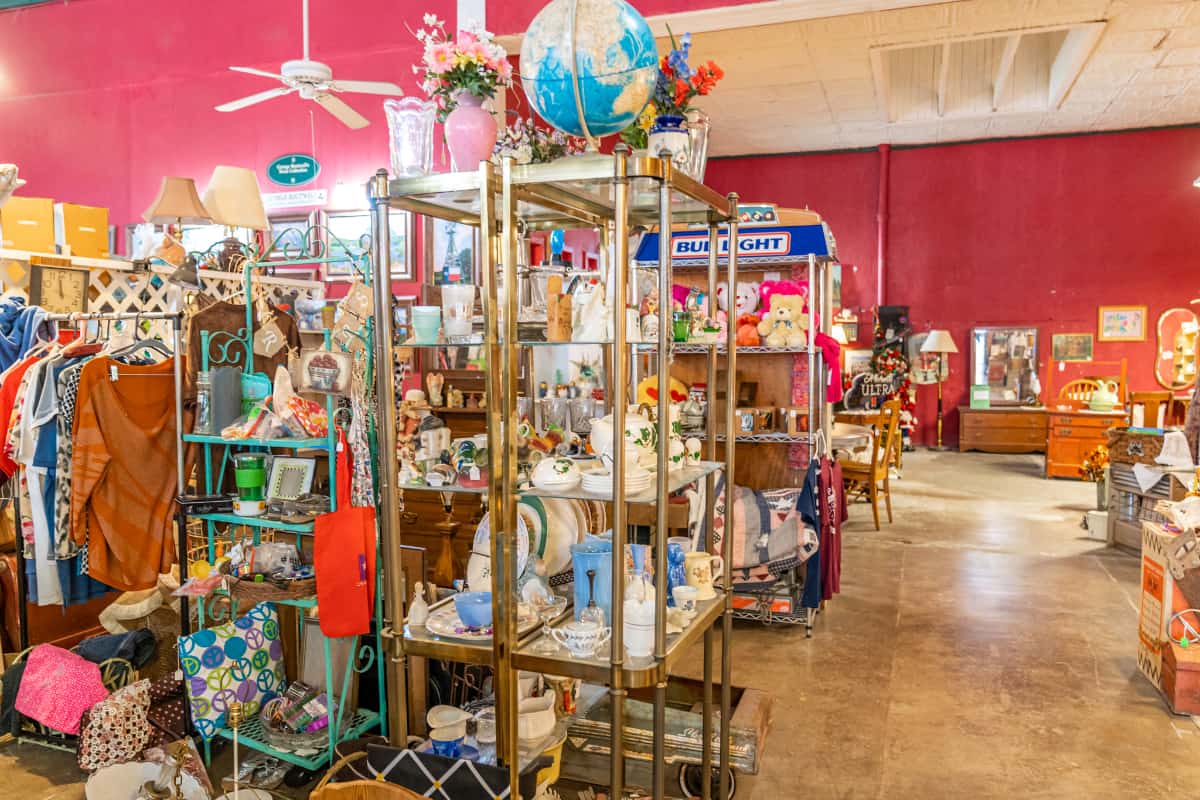 Shelves of goods and racks of clothes