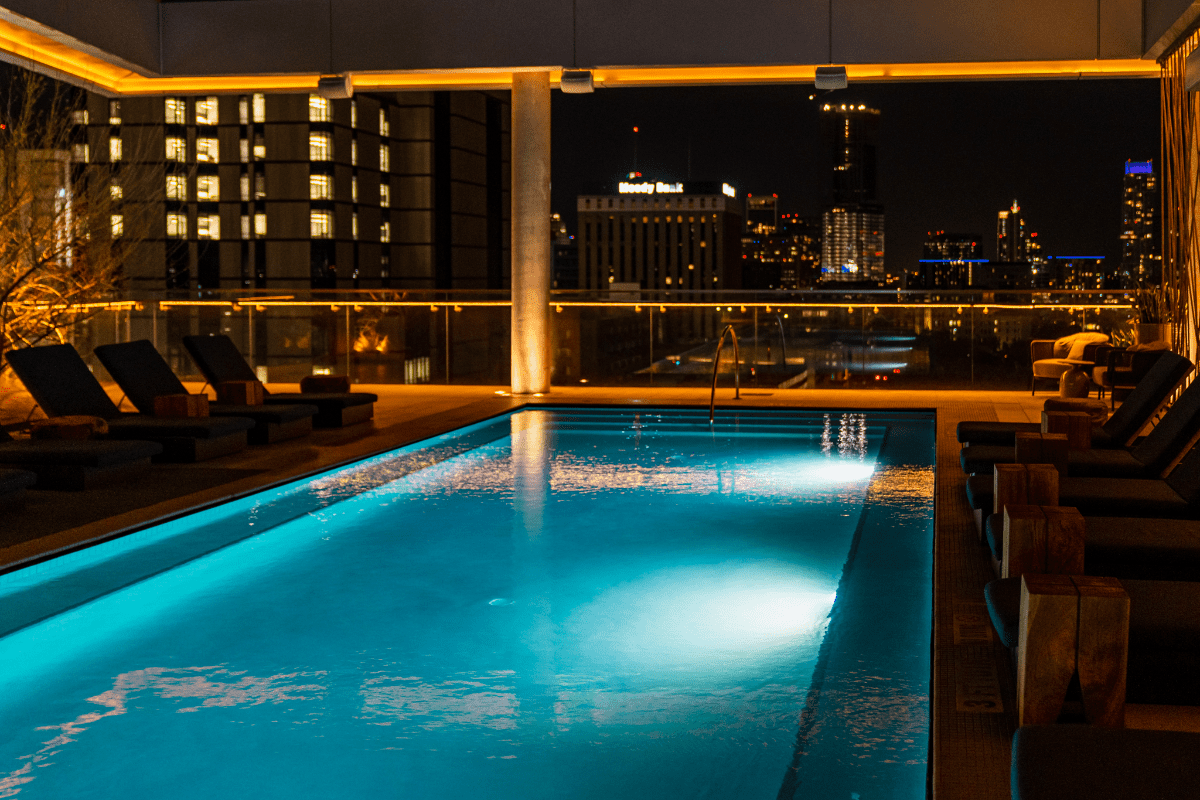 Rooftop pool area with skyline view