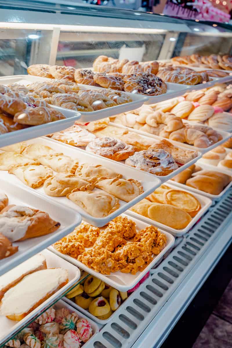 Bakery case full of baked goods