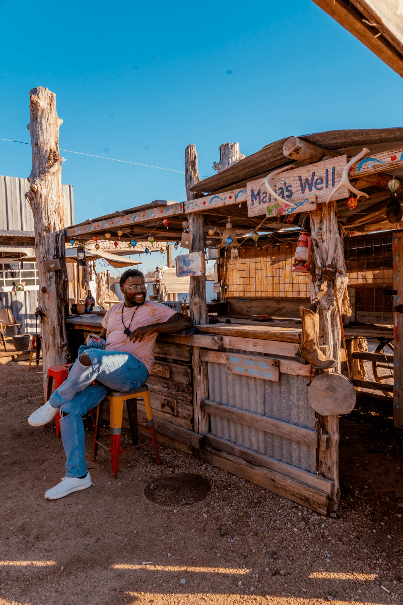 Man sitting by the outdoor bar