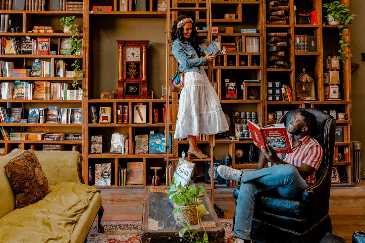 Couple reading a book at the library/bookstore