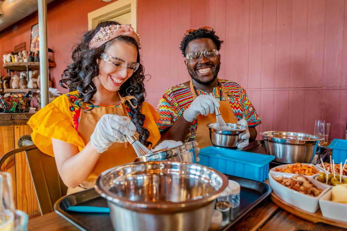 A couple making soap together