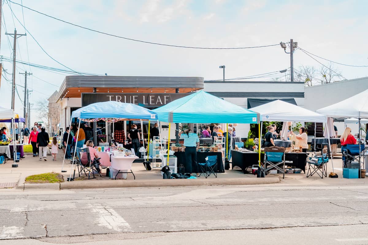 Vendor tents in front of the True Leaf store