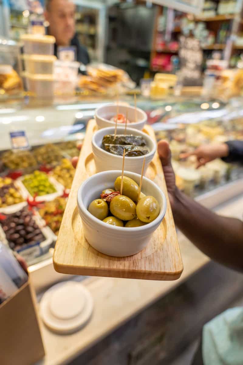 Array of olives on a board
